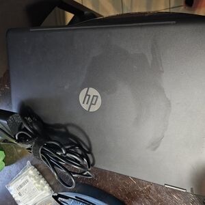 HP Black Laptop with Slim Design and Textured Finish